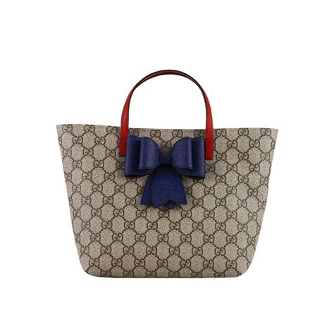 gucci boy cut|Gucci shopping bag.